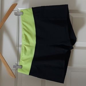 No name women's athletic shorts. Color is black and neon green size is XL.